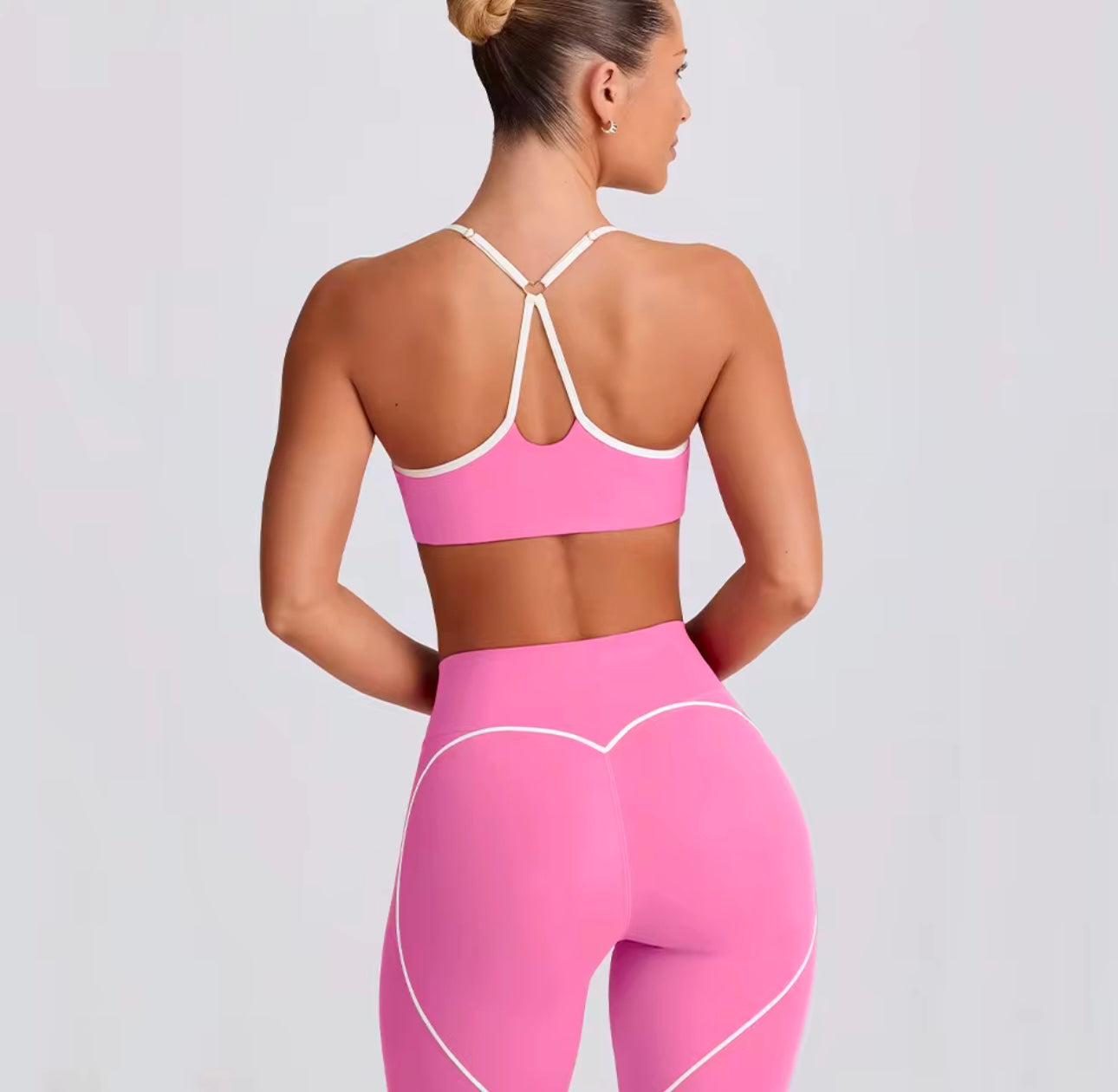 Pink bubble gum sports bra